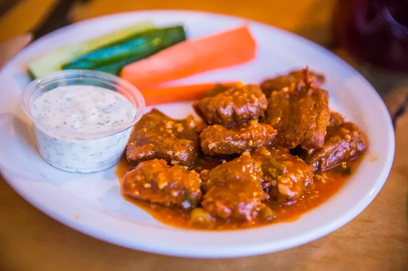 Image: The Buffalo wings at Green come with a side of house-made ranch.