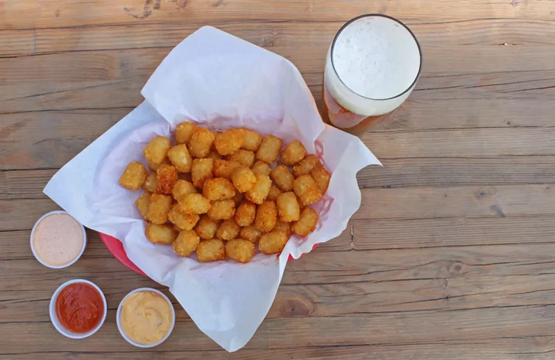Image: A hefty basket of tots from Angels Trumpet Ale House.