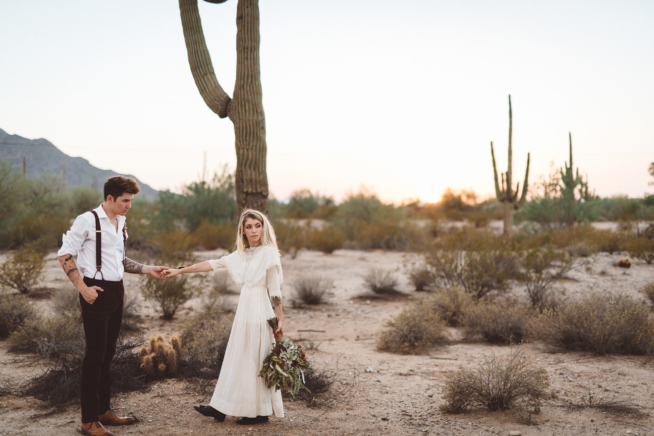 Husband and wife photography team Jonnie + Garrett coordinated this Southwestern Wedding Inspiration shoot to feature a unique 115-year-old dress