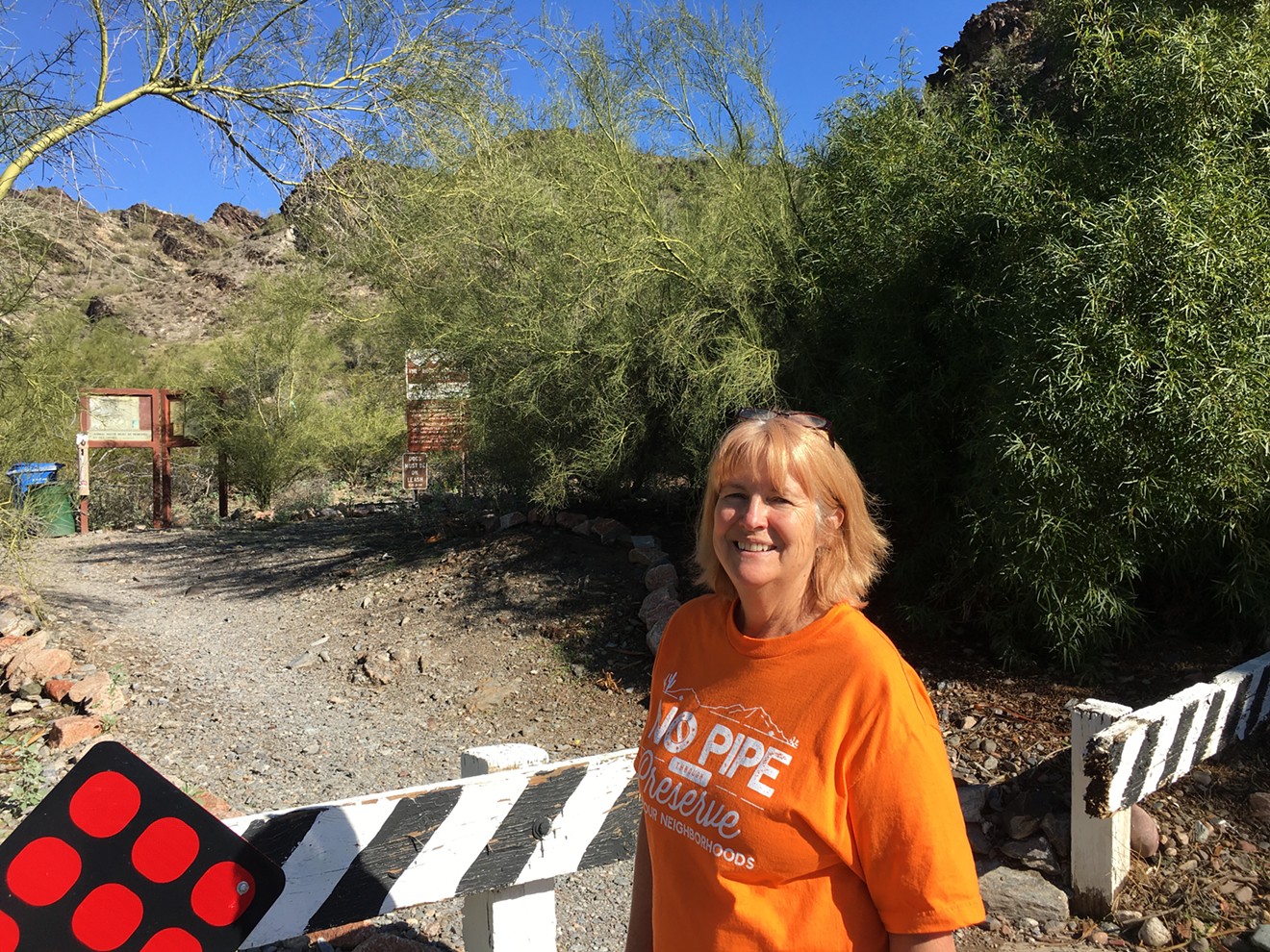Katherine Roxlo at an entrance to the Phoenix Mountain Preserve, not far from her home in Madison Heights.