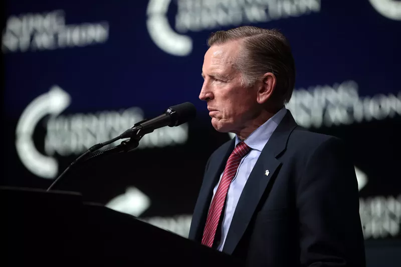 Image: U.S. Congressman Paul Gosar speaks with attendees at the "Rally to Protect Our Elections" hosted by Turning Point Action at Arizona Federal Theatre in Phoenix in July 2021.