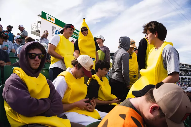 Image: A group of young men in banana costumes.