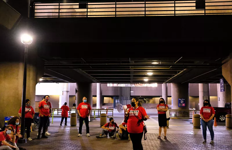 Image: A Sky Harbor worker speaks at Wednesday's strike