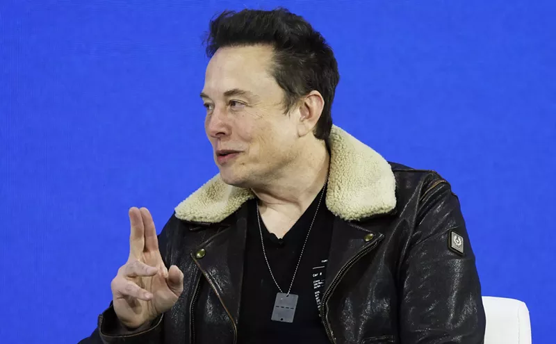Image: X suspends, then restores social media accounts critical of Elon Musk
