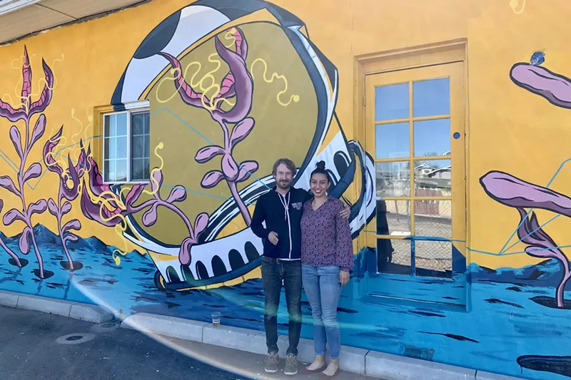 Image: Xanadu Coffee Co. owners Randall Denton and Jessica Bueno (mural by Oscar Ruiz).