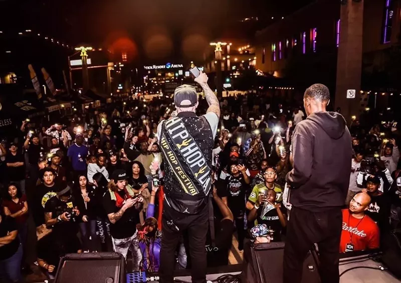 Image: Justus Samuel addresses the crowd at a previous Arizona Hip Hop Festival.