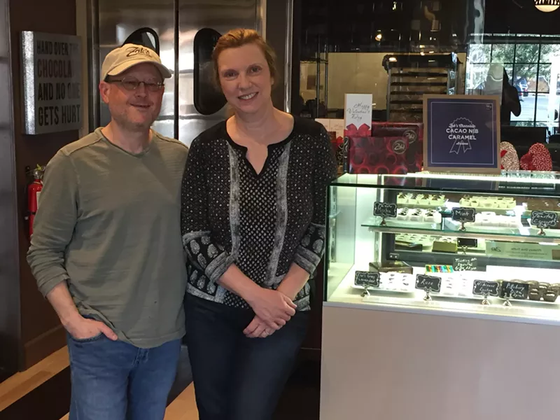 Image: Jim and Maureen Elitzak in the Zak's Chocolate showroom and production building.